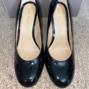 Kelly and Katie black shiny pumps.